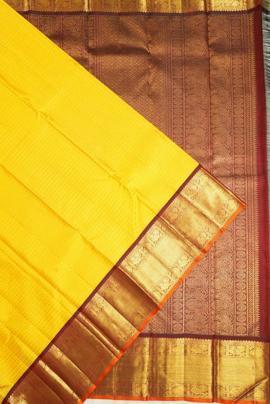 Kanchipuram Silk Checks And Butta Yellow Saree