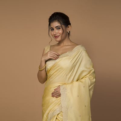 Tussar Butta Pastel Yellow Saree With Scallop Border