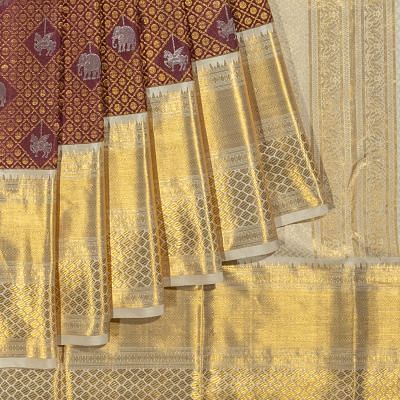 Kanchipuram Silk Checks And Butta Maroon Saree