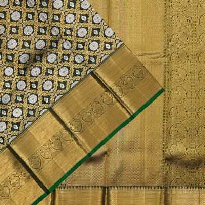 Kanchipuram Silk Criss Cross Checks And Butta Bottle Green Saree