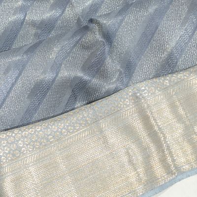 Taranga Kanchi Silk Tissue Diagonal Lines Pastel Blue Saree