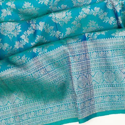 Kanchipuram Silk Antique Zari Jaal And Butta Dual Tone Green And Blue Saree