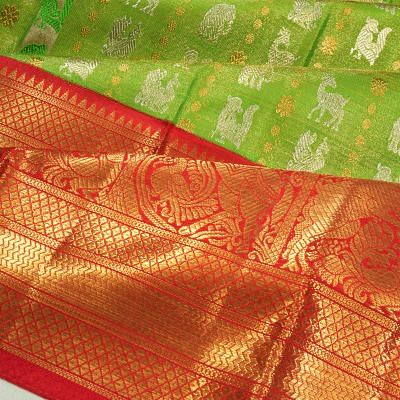 Kanchipuram Silk Tissue Vertical Lines And Butta Parrot Green Saree