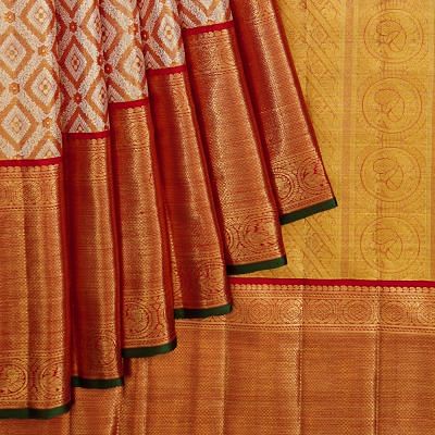 Kanchipuram Silk Tissue Criss Cross Checks And Butta Orange Saree