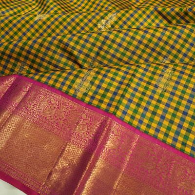 Kanchipuram Silk Checks And Butta Yellow Saree