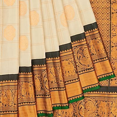 Gadwal Silk Checks And Butta Cream Saree