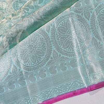 Taranga Kanchi Silk Tissue Brocade Pastel Blue Saree