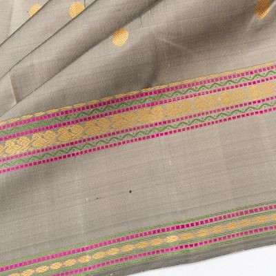 Classic Kanchipuram Silk Butta Pastel Grey Saree With Rettai Pettu Border