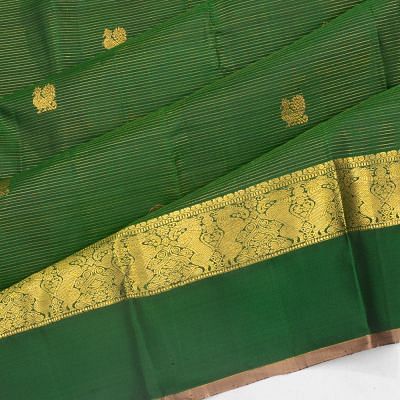 Kanchipuram Silk Oosi Lines And Butta Dark Green Saree