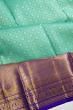 Kanchipuram Silk Criss Cross Checks And Butta Sea Green Saree