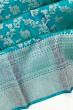 Kanchipuram Silk Antique Zari Jaal And Butta Teal Blue Saree