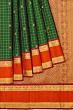 Kanchipuram Silk Checks And Butta Bottle Green Saree