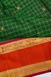 Kanchipuram Silk Checks And Butta Bottle Green Saree