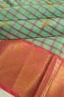 Kanchipuram Silk Checks And Butta Sea Green Saree