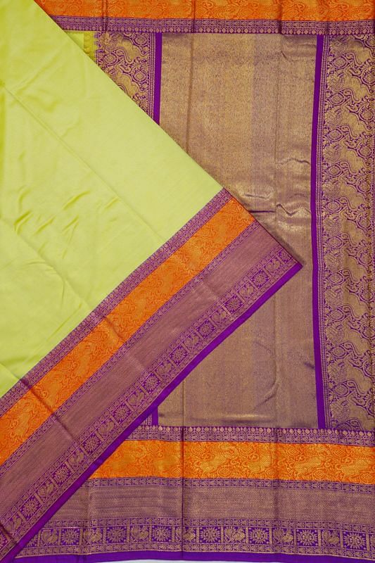 Kanchipuram Silk Twill Plain Pista Green Saree With Ikat Blouse