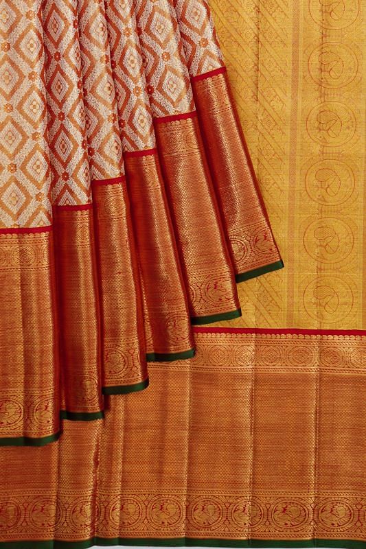 Kanchipuram Silk Tissue Criss Cross Checks And Butta Orange Saree