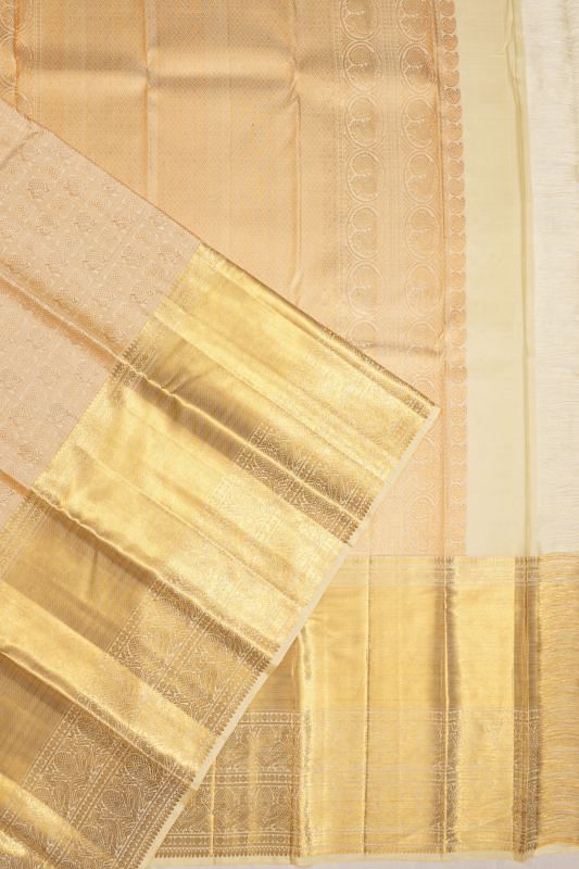 Kanchipuram Silk Checks And Butta Cream Saree