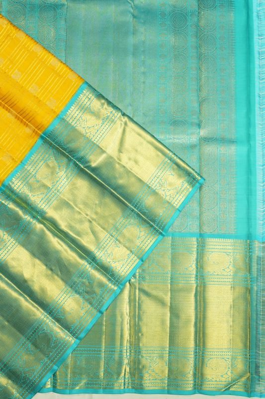 Kanchipuram Silk Checks And Butta Yellow Saree