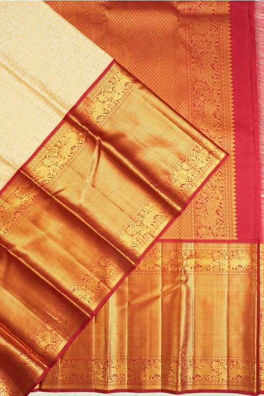 Kanchipuram Silk Checks And Butta Cream Saree