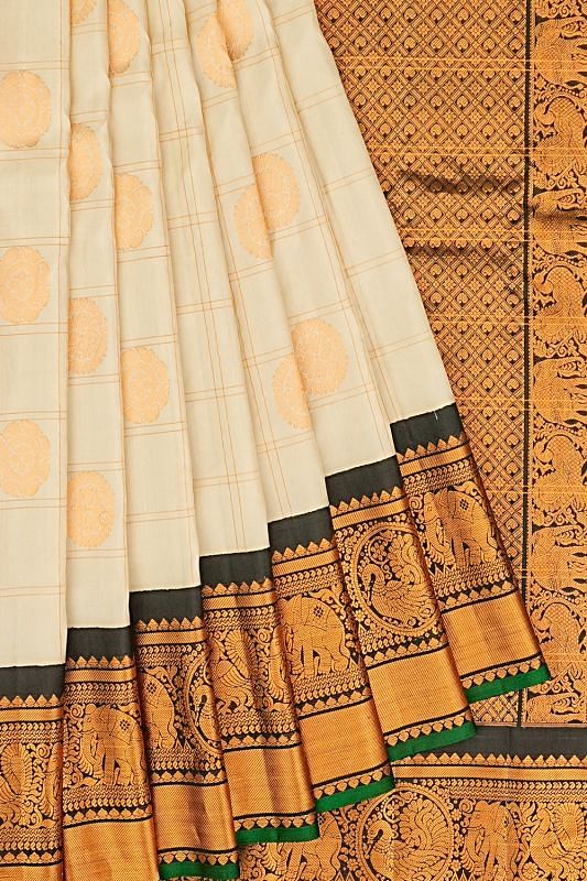 Gadwal Silk Checks And Butta Cream Saree