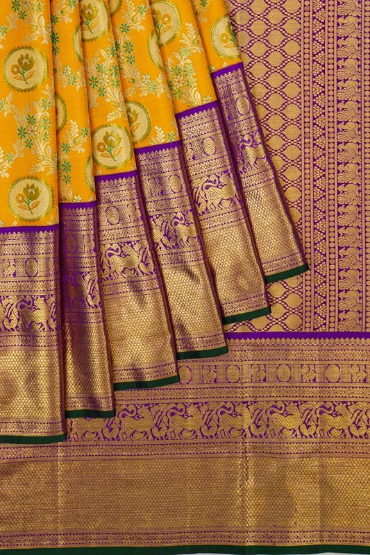 Kanchipuram Silk Jaal And Butta Yellow Saree